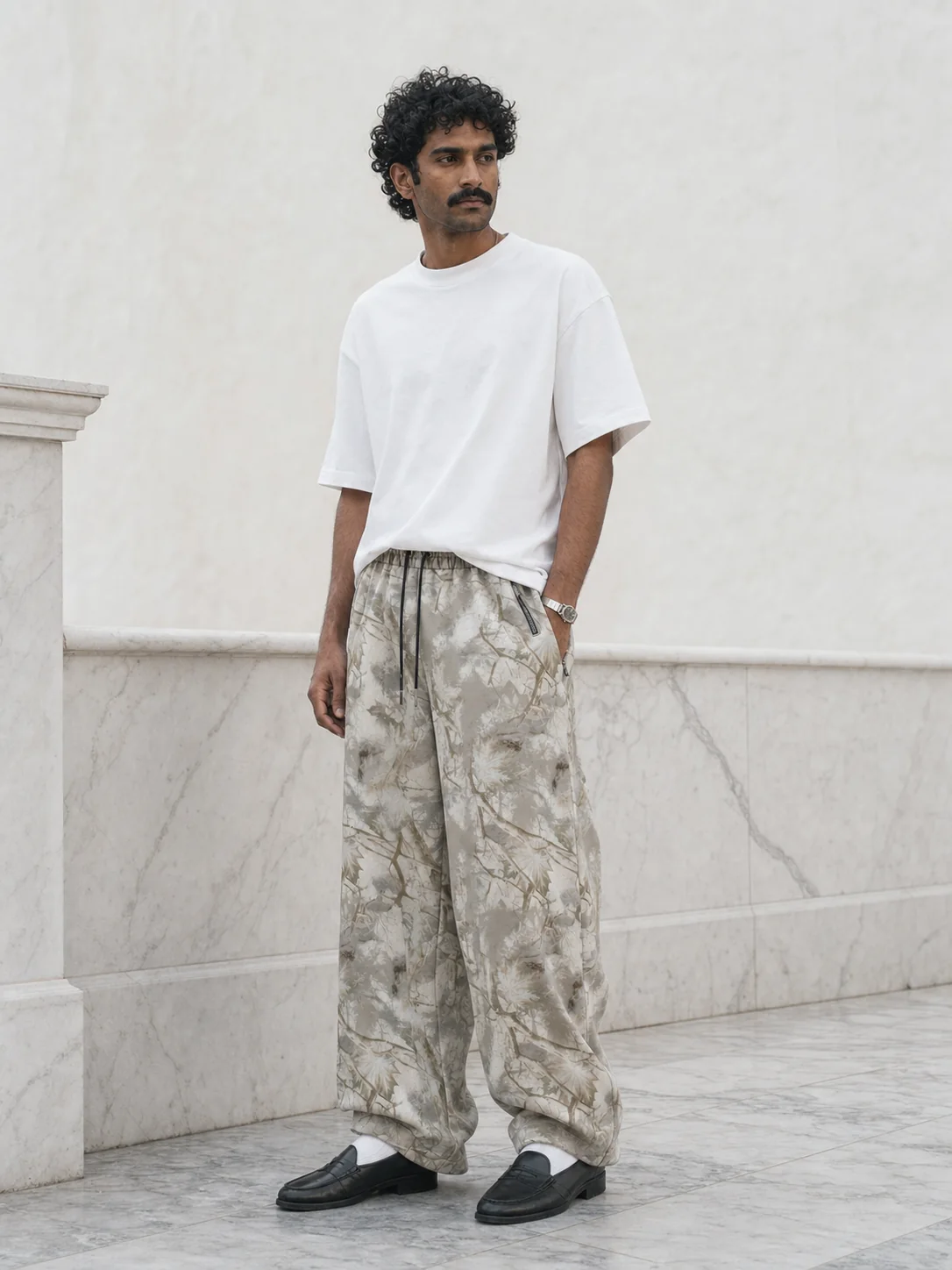Stone Mist jogger portrait against marble
